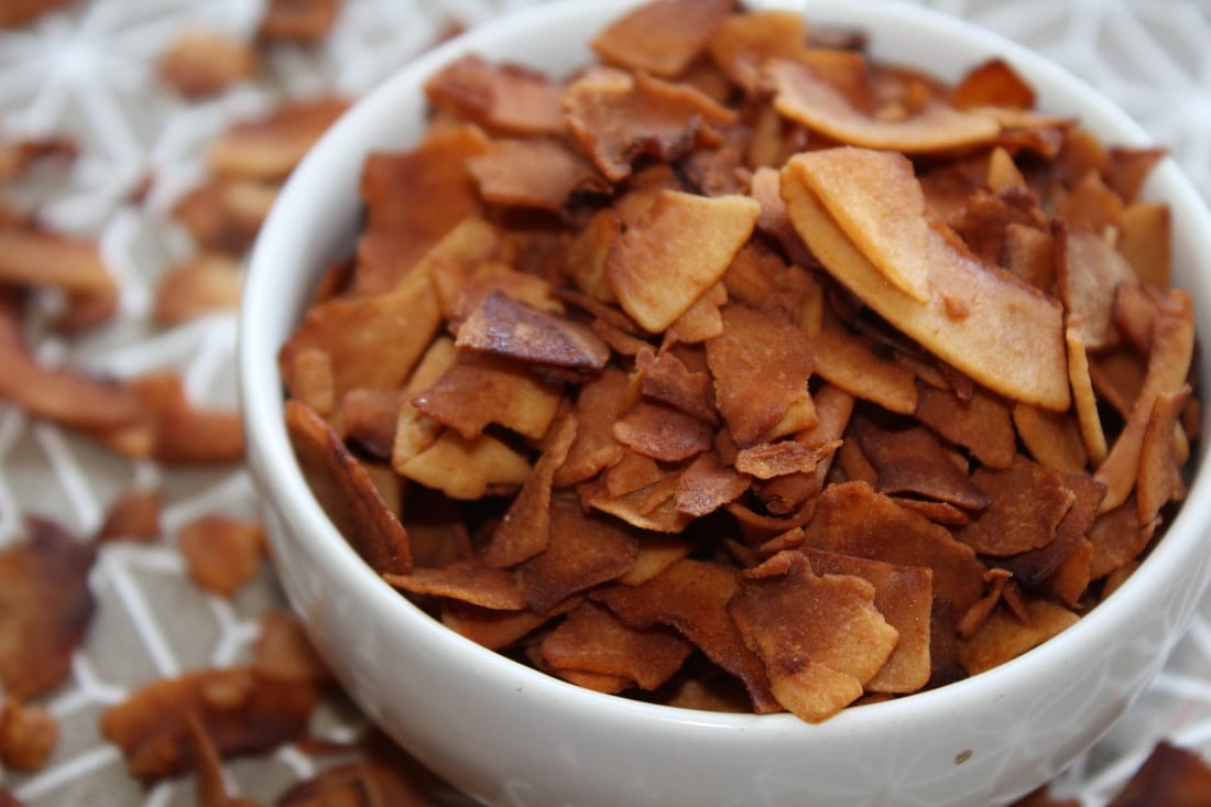 Coconut bacon in a white bowl