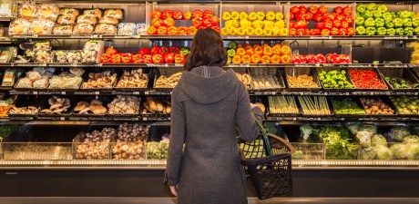 woman in front of produce