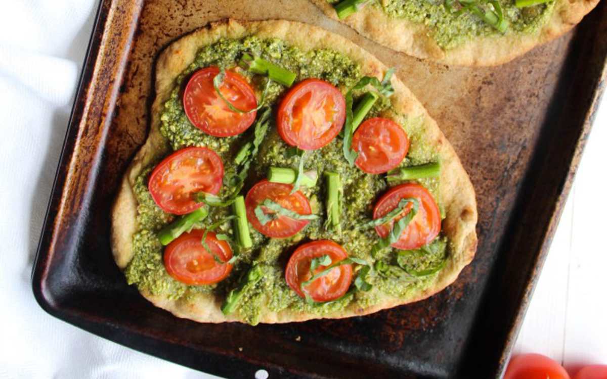Vegan Pesto Naan Pizza With Roasted Tomatoes and Asparagus