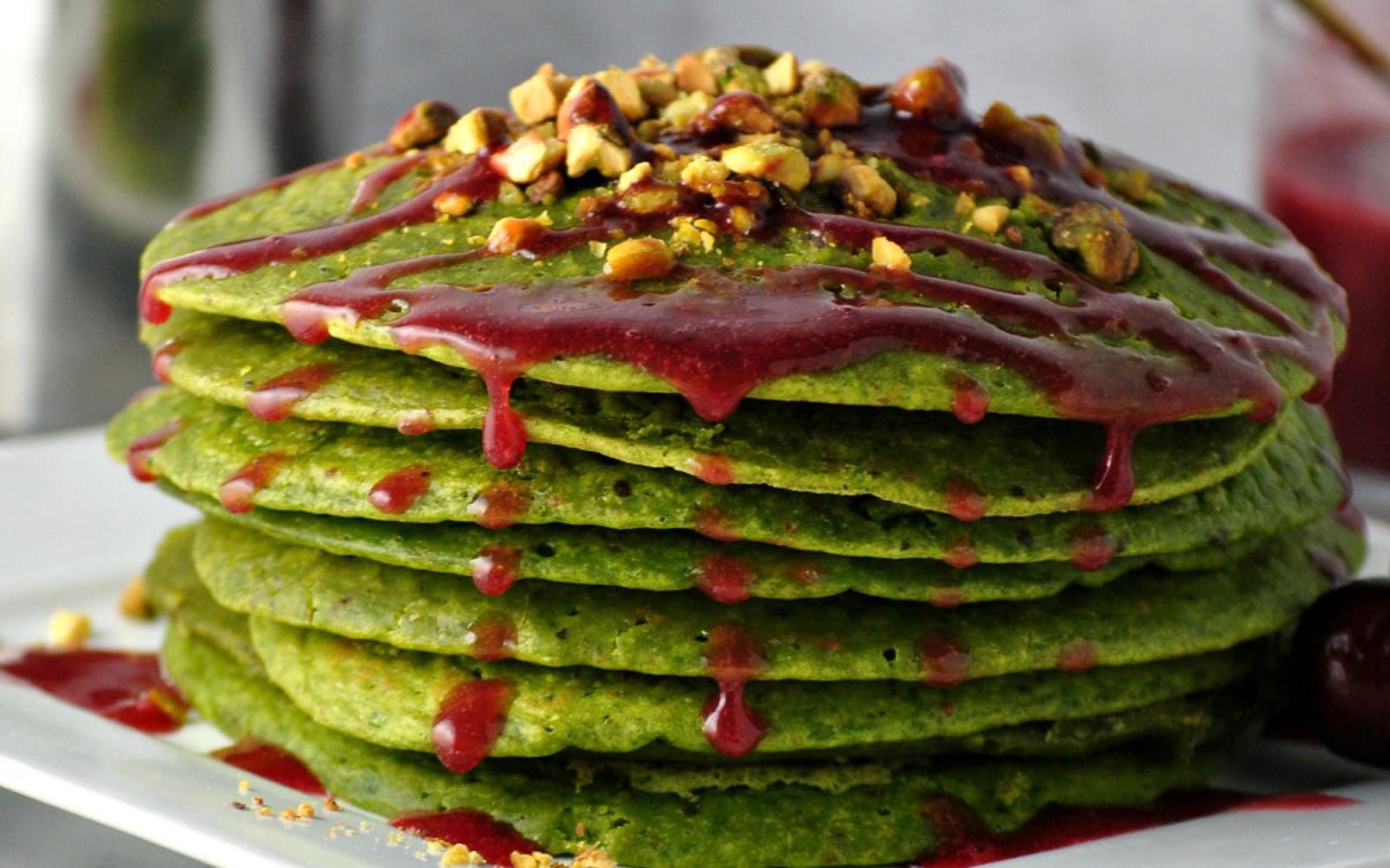 pistachio pancakes with cherry syrup