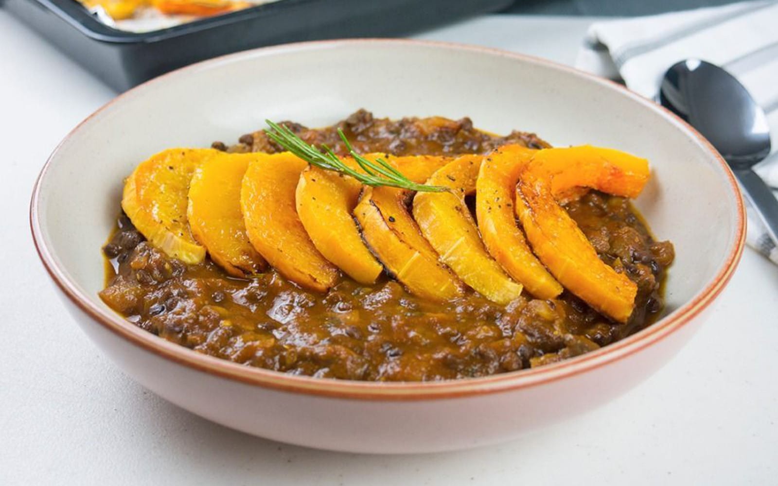 Rosemary Roasted Butternut Squash With Lentil, Tomato, and Mushroom Sauce