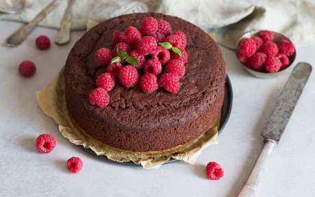 Vegan Gluten-Free Chocolate Sponge Cake Topped with Raspberries