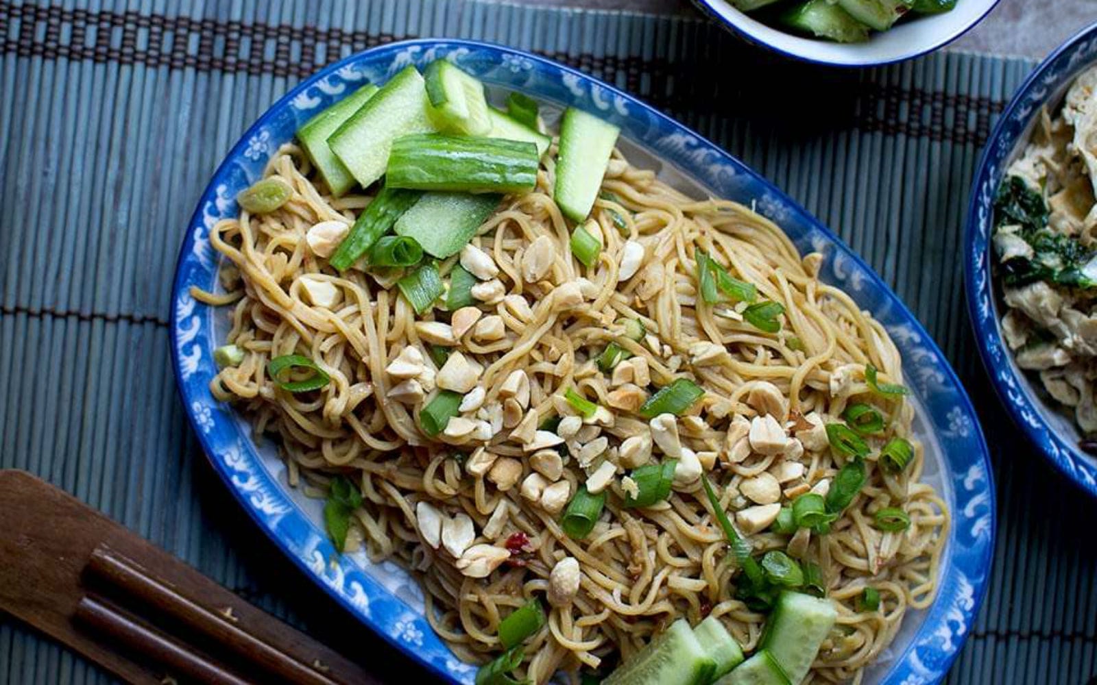 Vegan Chinese Cold Sesame Noodles topped with nuts and veggetables