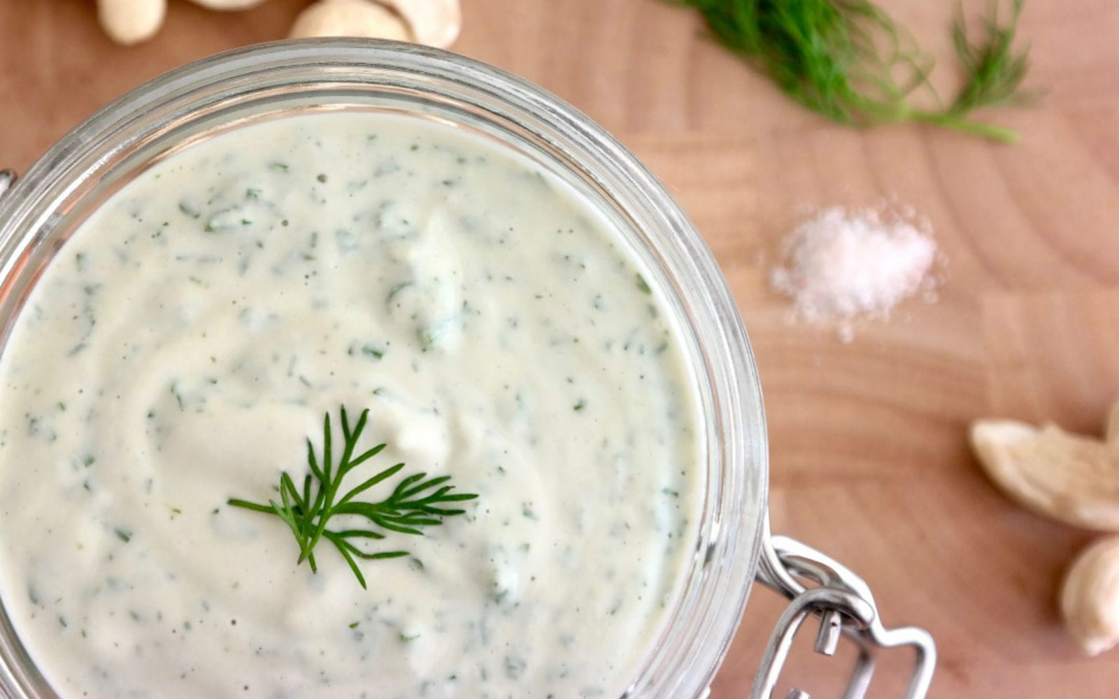 Vegan Gluten-Free Creamy Cucumber and Garlic Herb Dressing topped with dill