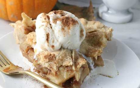 vegan apple pie with dairy-free ice cream and cinnamon