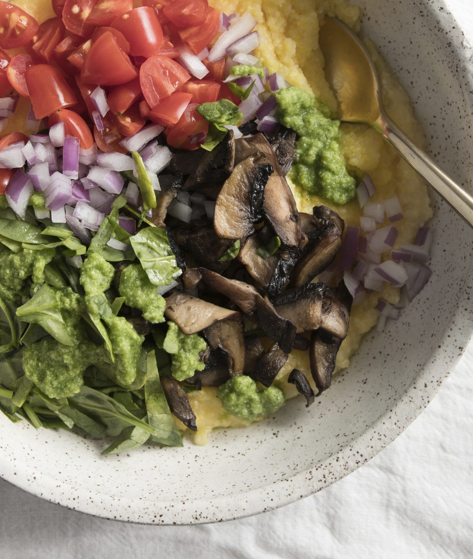 Soft Polenta and Mushroom Bowl with Walnut-Kale Pesto