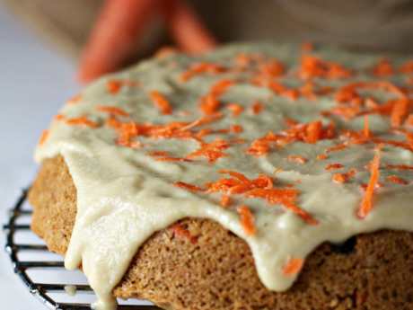 Decadent and light vegan carrot cake with orange maple frosting