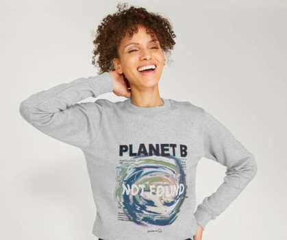 Woman wearing Planet B Not Found sweatshirt from Tiny Rescue